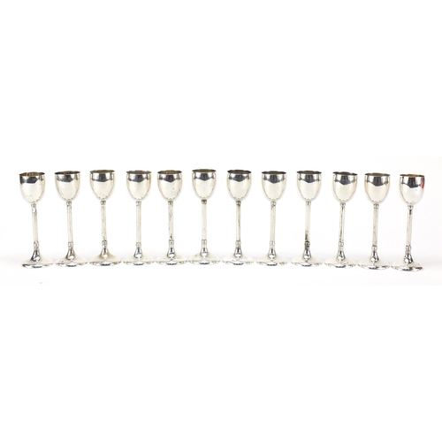 2219 - Set of twelve Austro Hungarian early 20th century  silver liqueur glasses, 12cm hhigh, total 645.0g