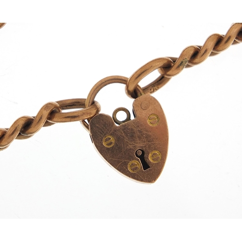 1617 - 9ct rose gold bracelet with love heart padlock, 18cm in length, 11.0g