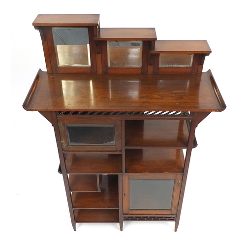 1450 - Arts & Crafts aesthetic mahogany cabinet in the manner of Liberty & Co with mirrored top and cupboar... 