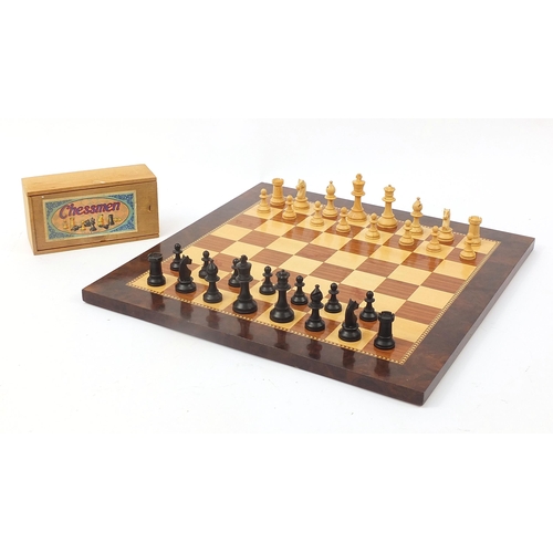 363 - Staunton pattern chess set by K & C Ltd of London together with an inlaid wooden chess board, the la... 