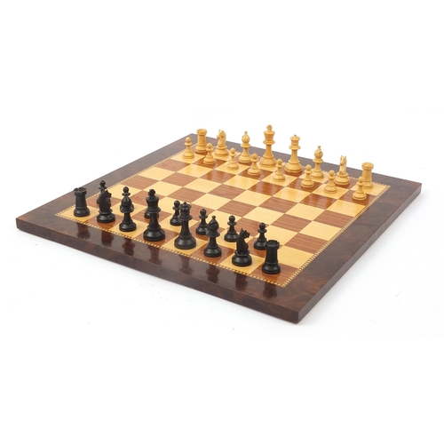 363 - Staunton pattern chess set by K & C Ltd of London together with an inlaid wooden chess board, the la... 