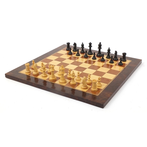 363 - Staunton pattern chess set by K & C Ltd of London together with an inlaid wooden chess board, the la... 