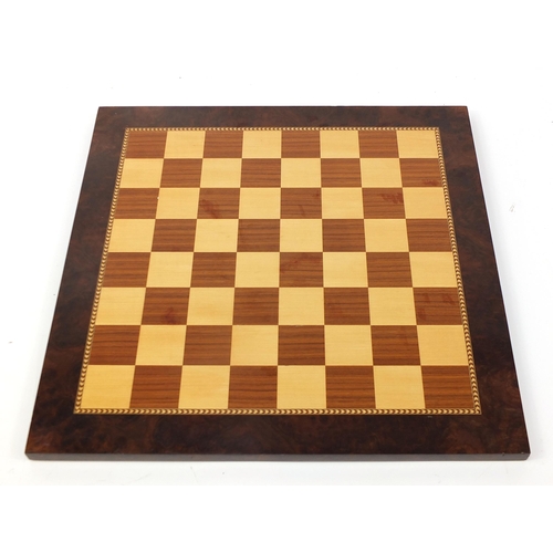 363 - Staunton pattern chess set by K & C Ltd of London together with an inlaid wooden chess board, the la... 