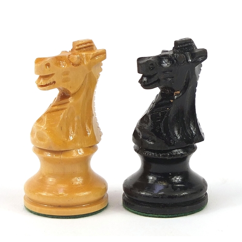 364 - Staunton pattern chess set and draughts with board, the largest pieces each 7cm high, the board 40cm... 