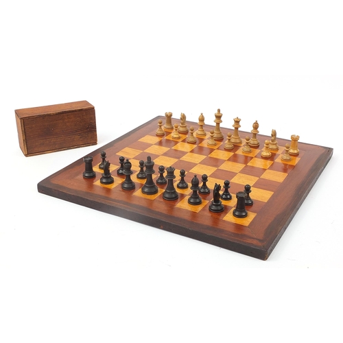 362 - Mahogany and boxwood inlaid chess board and a Staunton pattern chess set