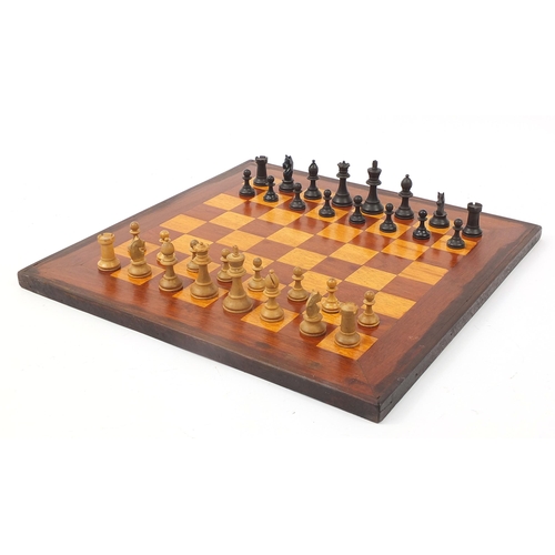 362 - Mahogany and boxwood inlaid chess board and a Staunton pattern chess set