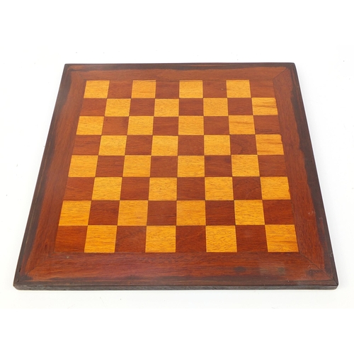 362 - Mahogany and boxwood inlaid chess board and a Staunton pattern chess set