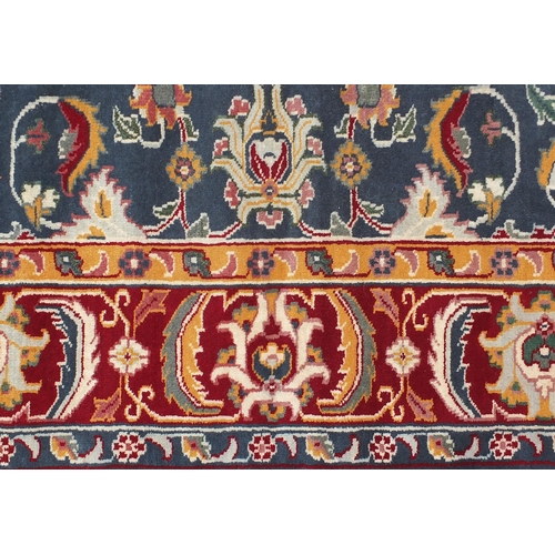 1475 - Large Indian hand woven blue ground rug, 360cm x 280cm