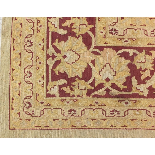 1457 - Large Indian hand woven beige ground rug, 532cm x 350cm