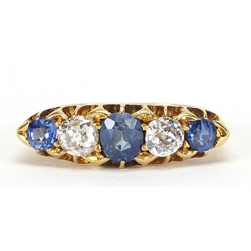 1603 - Victorian 18ct gold sapphire and diamond five stone ring, the central sapphire approximately 4.8mm x... 