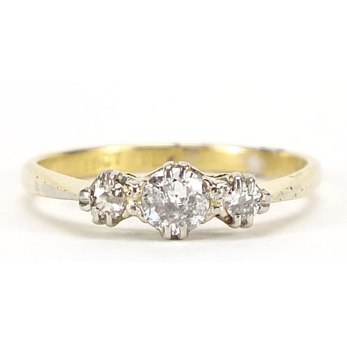 1631 - 18ct gold and platinum diamond trilogy ring, size M, 2.1g