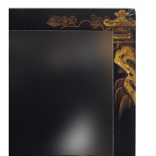 348 - Chinoiserie black lacquered wall mirror decorated with figures and pagodas, with bevelled glass, 33c... 