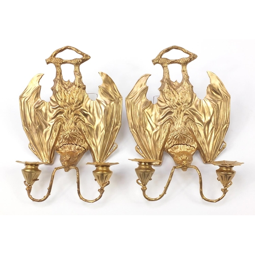 340 - Pair of Art Nouveau style patinated bronze two branch bat design wall sconces, each 36cm high