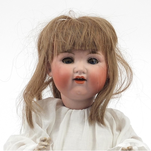 368 - Armand Marseille bisque headed doll numbered 990 to the back of the head, 49cm in length