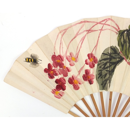 320 - Attributed to Qi Baishi - Bee and Malus Halliana, Chinese ink and watercolour fan, 46cm wide