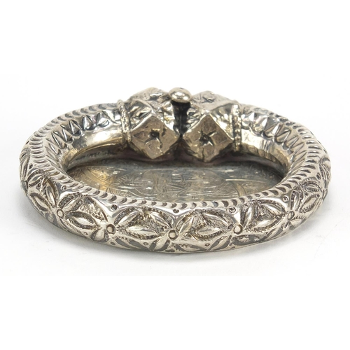 2216 - Tibetan unmarked silver slave bangle dish, 9.5cm wide, 87.0g