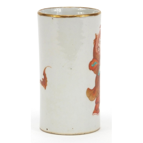 82 - Chinese porcelain cylindrical brush pot finely hand painted in iron red with a warrior and two bats,... 