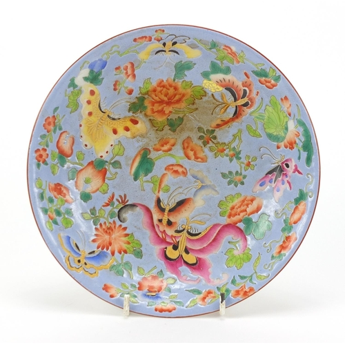 120 - Chinese porcelain shallow dish hand painted in the famille rose palette with butterflies amongst flo... 