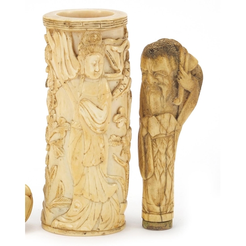 88 - Chinese ivory and bone carvings including a tusk section carved with a figure amongst flowers and a ... 