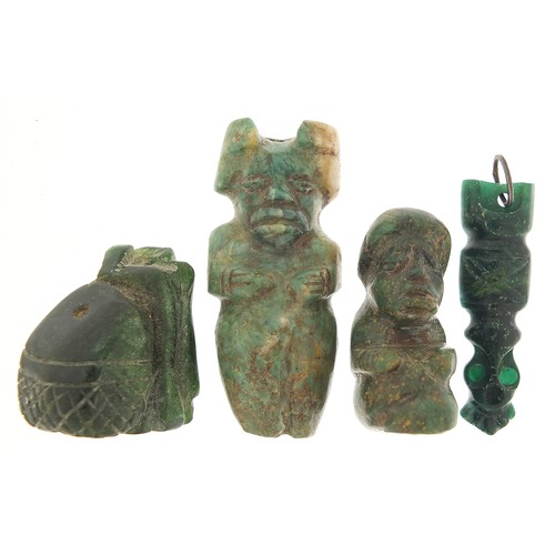 109 - Four antique green stone carvings including a Hei-tiki style pendant, the largest 5.5cm high