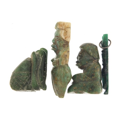 109 - Four antique green stone carvings including a Hei-tiki style pendant, the largest 5.5cm high