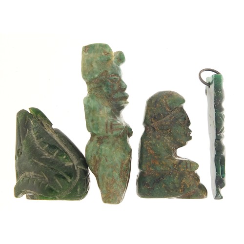 109 - Four antique green stone carvings including a Hei-tiki style pendant, the largest 5.5cm high