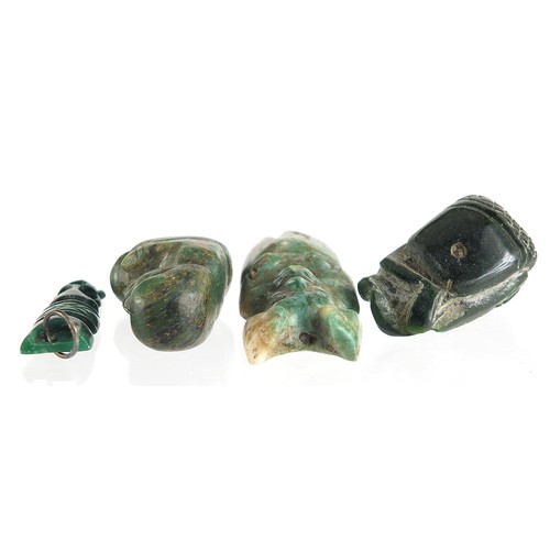 109 - Four antique green stone carvings including a Hei-tiki style pendant, the largest 5.5cm high