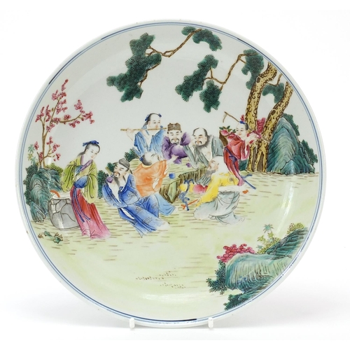 294 - Chinese porcelain shallow dish finely hand painted in the famille rose palette with an Emperor and f... 