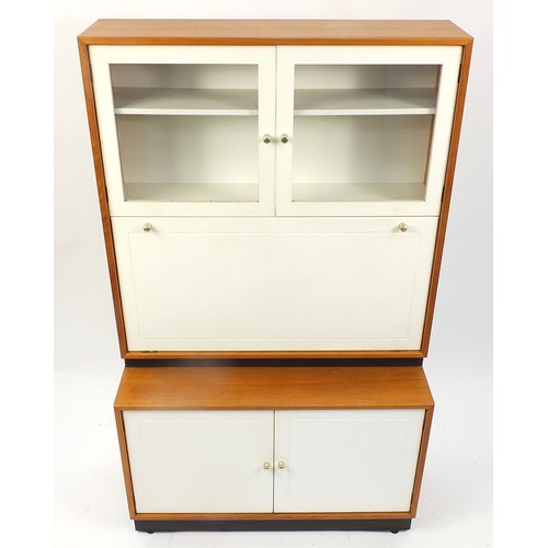 1479 - Gordon Russell, wall unit with glazed doors, drop down front and cupboard doors, 161cm H x 95cm W x ... 