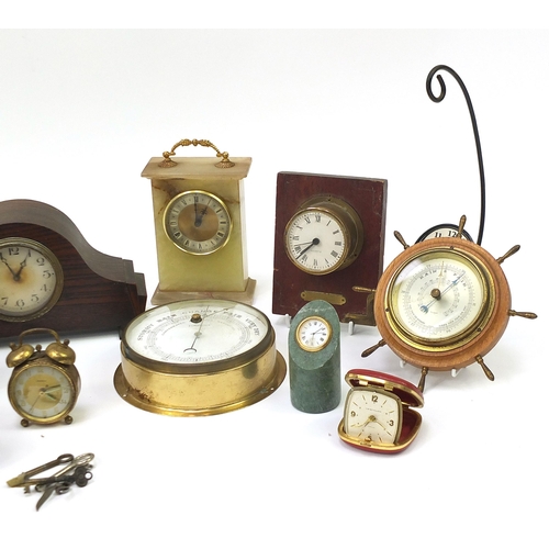 1881 - Collection of antique and later clocks and barometers including Smiths Enfield, onyx and brass cased... 