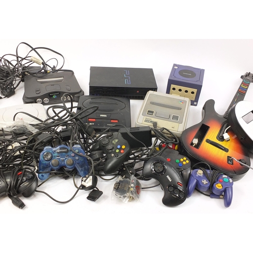 1920 - Retro games consoles and accessories including 
 Nintendo GameCube, Sega Mega Drive II, Sega Master ... 