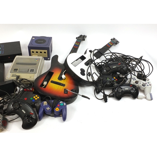 1920 - Retro games consoles and accessories including 
 Nintendo GameCube, Sega Mega Drive II, Sega Master ... 