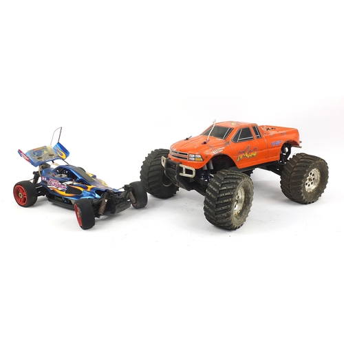 1900 - Two Nitro remote control cars including a Thunder Tiger monster truck