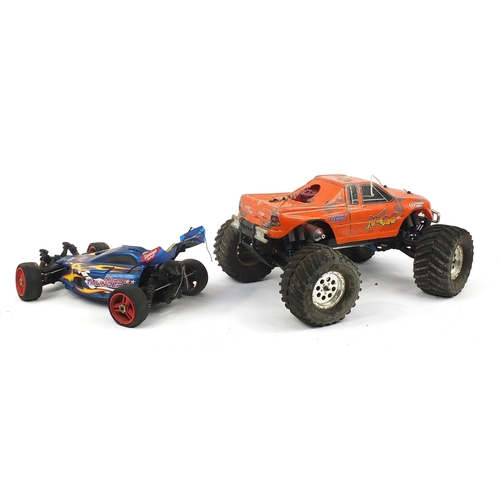 1900 - Two Nitro remote control cars including a Thunder Tiger monster truck