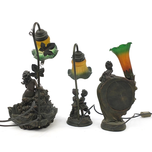 1898 - Three bronzed table lamps with glass shades including a mermaid water feature and mirror, the larges... 