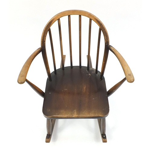 689 - Ercol elm child's rocking chair, 75cm high