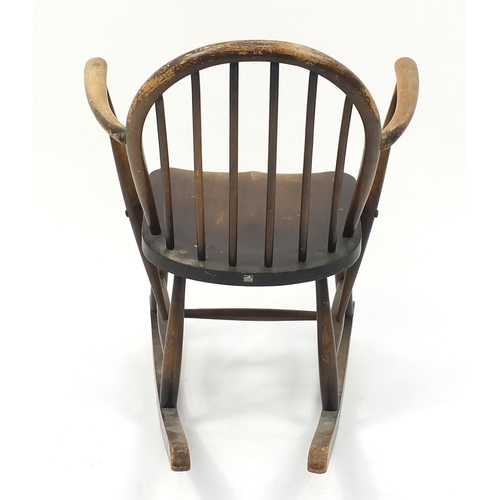 689 - Ercol elm child's rocking chair, 75cm high