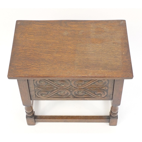 697 - Carved oak work table with hinged lid, 50cm H x 51cm W x 31cm D