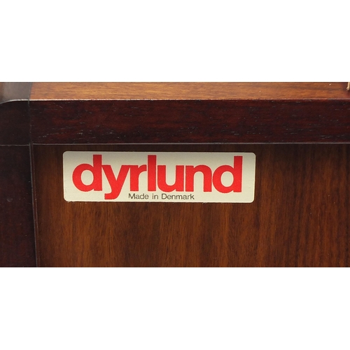 694 - Dyrlund, Danish rosewood wall unit with three glazed doors above two sliding tambour doors, enclosin... 