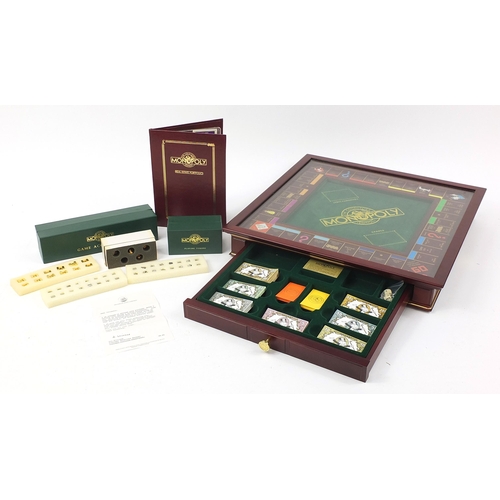 1955 - The Collector's Edition Monopoly board game with accessories, 9.5cm H x 55.5cm W x 55.5cm D