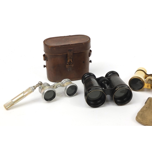 643 - Three pairs of opera glasses and a pair of binoculars including an ivory pair