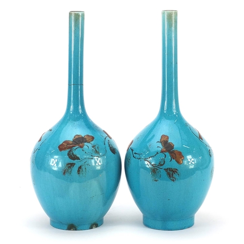 796 - Pair of Chinese porcelain blue glazed vases gilded with birds amongst flowers, each 39.5cm high