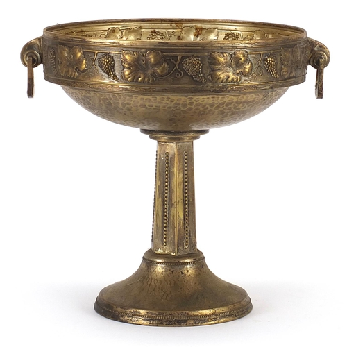 52 - Art Deco bronzed centrepiece with twin handles decorated in relief with leaves and berries, 29cm hig... 