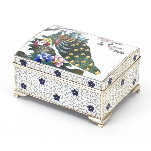 225 - Ando, Japanese dome top cloisonne musical box enamelled with a peacock amongst prunus blossom, 6cm H... 
