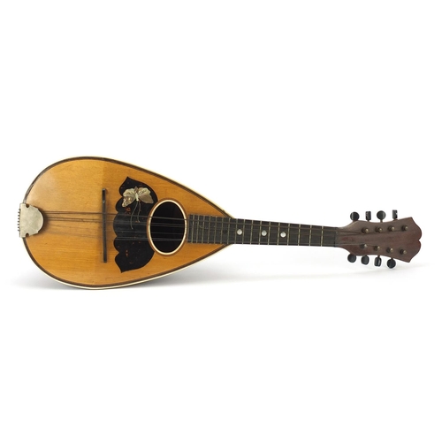 1986 - Rosewood mandolin with mother of pearl and tortoiseshell inlay, bearing a Antonio Grauso label to th... 