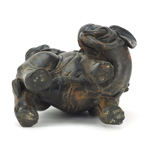 641 - Chinese patinated bronze figure group of two figures washing an elephant, 22cm high