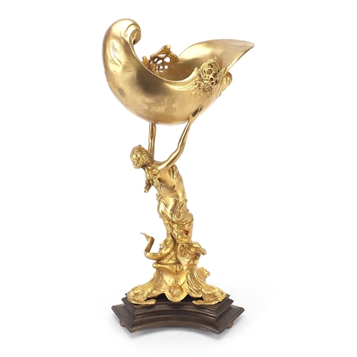 305 - Classical gilt bronze centrepiece in the form of a mermaid holding a shell, 38cm high