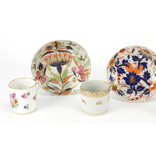 161 - 19th century porcelain comprising four coffee cans and three dishes, each hand painted with flowers,... 