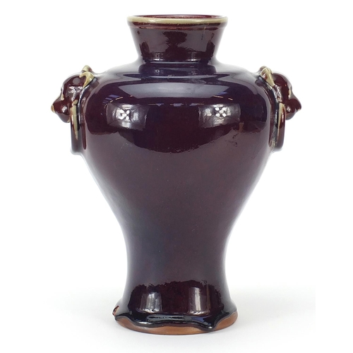 637 - Chinese porcelain vase with animalia ring turned handles and a flambé glaze, 28cm high