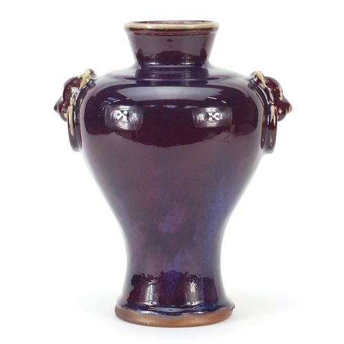 637 - Chinese porcelain vase with animalia ring turned handles and a flambé glaze, 28cm high